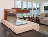 Modern home with Doors, Exterior, Interior, Folding Door Type, Wood, and Metal. Two-sided gas burning fireplace, polished concrete floors, couch, table made of salvaged wood from the original 100-year old float, opening glass NanaWall system WA67 Photo 10 of Houseboat H