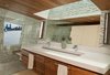 Modern home with Bath Room, Light Hardwood Floor, Glass Tile Wall, Drop In Sink, Enclosed Shower, Engineered Quartz Counter, and Recessed Lighting. Ceiling and cabinets finished with wood salvaged from the original, 100-year old houseboat that burned down, sea green tiles, bamboo floors, drop in sink Photo 14 of Houseboat H
