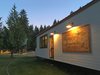 Modern home with Exterior, House Building Type, Metal Roof Material, Wood Siding Material, and A-Frame RoofLine. Iki hau'oli hale sign, Dutch door Photo 16 of Iki Hau'oli Hale (Tiny Happy Home)