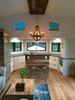 Modern home with Living Room, Pendant Lighting, Sofa, Light Hardwood Floor, and Track Lighting. Living room and full-size chef's kitchen Photo 3 of Iki Hau'oli Hale (Tiny Happy Home)