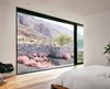 Modern home with Bedroom and Light Hardwood Floor. A multi-slide door in the master suite opens up to the natural mountain preserve. Photo 4 of West Texas Vistas