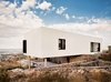 The upper-volume living quarters feature unparalleled views of El Paso and Ciudad Juarez, Mexico, in the distance. Photo 7 of West Texas Vistas modern home