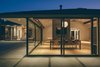 When closed, the room's multi-slide doors meet at 90 degrees without a connecting post. Photo 6 of A Perfect Match modern home