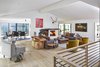 When its numerous sliding glass doors are opened, the sunroom becomes one with the outdoors. Photo 4 of Georgia Peach modern home