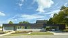 Modern home with Exterior, House Building Type, Wood Siding Material, Concrete Siding Material, and Brick Siding Material. West Elevation Photo 3 of The Graphic House