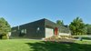 Modern home with Exterior, House Building Type, Wood Siding Material, Brick Siding Material, and Concrete Siding Material. Northwest Corner Photo 5 of The Graphic House