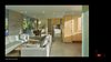 Modern home with Engineered Quartz Counter, Wood Cabinet, Concrete Floor, Subway Tile Backsplashe, Ceiling Lighting, Pendant Lighting, Accent Lighting, Refrigerator, Wall Oven, Microwave, Range Hood, Cooktops, Chair, Sofa, Coffee Tables, Dining Room, Table, Stools, and Bar. View from Living Room Photo 10 of The Graphic House
