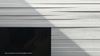 Modern home with Gas Burning Fireplace and Standard Layout Fireplace. Detail of Sunlight on the Textured Fireplace Surface Photo 12 of The Graphic House