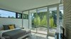 Modern home with Concrete Floor and Ceiling Lighting. Master Bedroom Photo 17 of The Graphic House