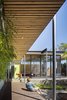 Modern home with Outdoor, Back Yard, Wood Patio, Porch, Deck, Decking Patio, Porch, Deck, Pavers Patio, Porch, Deck, Walkways, and Retaining Fences, Wall. Raised walkway between house and studio Photo 2 of Grasshopper Studio