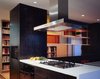 Modern home with Kitchen, Range Hood, and Cooktops. Kitchen peninsula and plexiglas shelving Photo 3 of Home for a Professor
