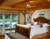 The Timber Framed Master Bedroom has Direct Pool Access Photo 15 of Yellow Brook Farm House modern home