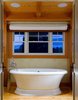 Deep Soaking Tub in the Master Bathroom Photo 17 of Yellow Brook Farm House modern home
