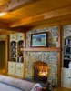 A Cozy Fireplace Adds a Bit of Intimacy to this Master Bedroom Suite Photo 16 of Yellow Brook Farm House modern home