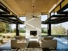 Modern home with Living Room, Standard Layout Fireplace, Sofa, Concrete Floor, and Recessed Lighting. Glazed garage doors by Renlita lift up to completely open the home to nature. Photo 9 of Sonoma Wine Country I