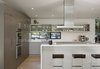 Modern home with Kitchen, Recessed Lighting, Range Hood, Medium Hardwood Floor, Undermount Sink, and Wall Oven. Creekside Residence Photo 8 of Creekside Residence