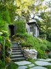 Modern home with Outdoor, Shrubs, Woodland, Walkways, Side Yard, Gardens, Trees, Garden, and Boulders. Large columns and shear walls offer the structural support needed to mitigate minor earthquakes.
Photo 2 of Mill Valley Cabins