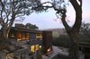 Modern home with Exterior, Wood Siding Material, Shed RoofLine, Green Roof Material, and House Building Type. House Ocho Photo 3 of House Ocho