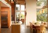 Modern home with Kitchen, Wood Cabinet, and Ceiling Lighting. House Ocho Photo 7 of House Ocho