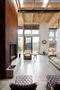 Modern home with Living Room, Chair, Sofa, Recliner, Ceiling Lighting, and Standard Layout Fireplace. House Ocho Photo 11 of House Ocho
