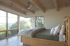Modern home with Bedroom, Storage, Bookcase, Ceiling Lighting, and Bed. House Ocho Photo 14 of House Ocho