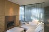 Modern home with Living Room, Sectional, Ceiling Lighting, and Standard Layout Fireplace. House Ocho Photo 18 of House Ocho