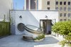 Roof garden with skylight in the open position. Photo 17 of White Street Residence modern home