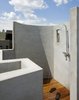 Modern home with Outdoor. The outdoor shower with built-in bench and Ipe deck. The shower fitting was made from off the shelf parts sourced from a local plumbing supply house. Photo 3 of East Village Roof Garden
