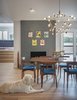 Modern home with Dining Room, Chair, Table, Light Hardwood Floor, Pendant Lighting, Ceiling Lighting, and Standard Layout Fireplace. Fireplace in living/dining area. Photo 5 of Gallery Residence
