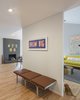 Modern home with Hallway and Light Hardwood Floor. Demarcation of living/dining space. Photo 6 of Gallery Residence