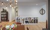 Modern home with Living Room, Shelves, Light Hardwood Floor, Pendant Lighting, Ceiling Lighting, Storage, and Bookcase. Stairs to basement, concealed by a curated art collection. Photo 10 of Gallery Residence