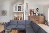 Modern home with Living Room, Sofa, Coffee Tables, Recessed Lighting, Storage, and Light Hardwood Floor. Second-floor sitting area. Photo 12 of Gallery Residence