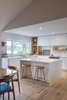 Modern home with Light Hardwood Floor and Recessed Lighting. Kitchen island. Photo 13 of Gallery Residence