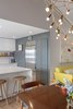 Modern home with Pendant Lighting, Light Hardwood Floor, and Recessed Lighting. Integrated refrigerator. Photo 15 of Gallery Residence