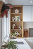 Modern home with Recessed Lighting. Displays for collectibles incorporated into the kitchen. Photo 16 of Gallery Residence