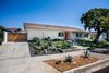 Modern home with Exterior, House Building Type, Shingles Roof Material, Stone Siding Material, and Stucco Siding Material. your Midcentury Ranch HAUS Photo of - : - MidCentury Ranch in Dover Shores - : - for sale : 4 bed | 3 bath | 2032 sq' | large lot with a pool