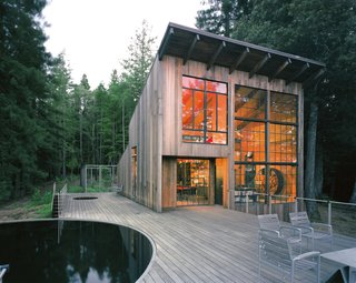 San Francisco firm Lundberg Design built this cabin out of reclaimed materials, including the exterior redwood, which has aged into an elegant, ashen gray. In a past life, the pool acted as a water tank for livestock.