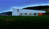 Modern home with Exterior, Cabin Building Type, Shed RoofLine, House Building Type, and Glass Siding Material. Situated on a cliff, the studio blocks the northern wind that blows over the sea. Photo 3 of Shobac Cottages