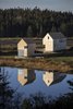 Modern home with Exterior, Shingles Roof Material, Cabin Building Type, Gable RoofLine, and Wood Siding Material. Point House stands on a peninsula that used to be a small fishing port. A dirt road leads to the shingled cottage and boathouse. Photo 11 of Shobac Cottages