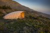 Modern home with Outdoor, Grass, Small Patio, Porch, Deck, Trees, Slope, and Shrubs. The Autonomous Tent is available to book for $495 plus tax per night. To make a reservation, visit the Treebones Resort website. Photo 5 of Treebones Resort