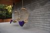 Modern home with Outdoor and Concrete Patio, Porch, Deck. Hanging rattan chairs invite guests to curl up with a cup of tea and enjoy views of the meadow. Photo 4 of AutoCamp Russian River