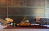 Modern home with Living Room, Coffee Tables, Rug Floor, Chair, Sofa, and Ottomans. Geremia Design created a texturally rich lounge area, its wood, leather, and textile elements softening the steel backdrop. Photo 3 of AutoCamp Russian River