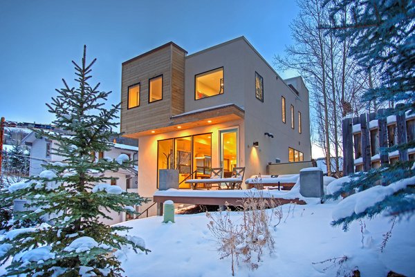 The building exterior incorporates stucco, cedar, Cor-Ten steel, and concrete for a balance of industrial and warm elements that isn't often seen in Park City.