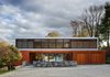 The 8,269-square-foot residence sits atop 2.8 acres landscaped by Reed Hilderbrand. Photo 2 of The Brown Residence modern home