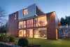 A zinc-clad addition complements the cedar-clad structure, emphasizing the “abstract formal precepts of Noyes’ design,” says Moore. Photo 8 of The Brown Residence modern home