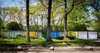 Modern home with Exterior, House Building Type, Flat RoofLine, and Prefab Building Type. Built with a steel frame, the Frost House features panels of styrofoam between aluminum sheets for the exterior walls and styrofoam between plywood for the roof and floors. Bold, primary colors accentuate its geometric form.
Shortly after Karen Valentine and Bob Coscarelli purchased the home in 2016, they began to unearth nuggets of information about its pedigree. Their realtor had provided a brochure that identified the prefab as designed by architect Emil Tessin for the now-defunct Alside Homes Corporation based out of Akron, Ohio, which had held a patent for the structure’s aluminum paneling. Their new neighbors provided a stack of Alside Homes sales materials, floor plans of various models, and even a script that had been written for salespeople during home tours. They determined that the Frost House had been a sales model for the company, and that Tessin had been the son of Emil Albert Tessin, the legal guardian of Florence Knoll. Photo of The Frost House