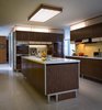 Modern home with Kitchen, Wall Oven, Refrigerator, and Terrazzo Floor. Paul McCobb designed the kitchen, built-in units, and vanities as well. Photo 6 of The Frost House