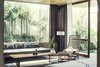 Modern home with Living Room, Chair, Bench, Coffee Tables, Concrete Floor, Rug Floor, Lamps, Floor Lighting, and Ottomans. Rooms don't come with televisions to encourage guests to disconnect (but don't worry—there's Wi-Fi). Pool Suites come with a private plunge pool. Photo 9 of The Slow
