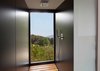 Modern home with Bath Room, Open Shower, and Medium Hardwood Floor. Ambient lighting is provided throughout the grounds but cause no light pollution or infringement on the environment. An upscale restaurant and lounge bar are also available for guests to enjoy. Photo 9 of VIVOOD Landscape Hotel