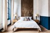Modern home with Bedroom, Bed, Light Hardwood Floor, Night Stands, and Lamps. One of the bedrooms, nicknamed "Billy" after William Penn, is a second-floor studio apartment that overlooks the boutique shops of 3rd Street. Photo 2 of Lokal Hotel